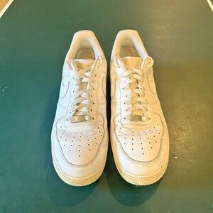 White Air Force 1, pretty used, has some creases, but still in good shape